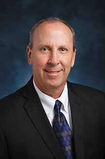 protrait of controller, patrick pierce